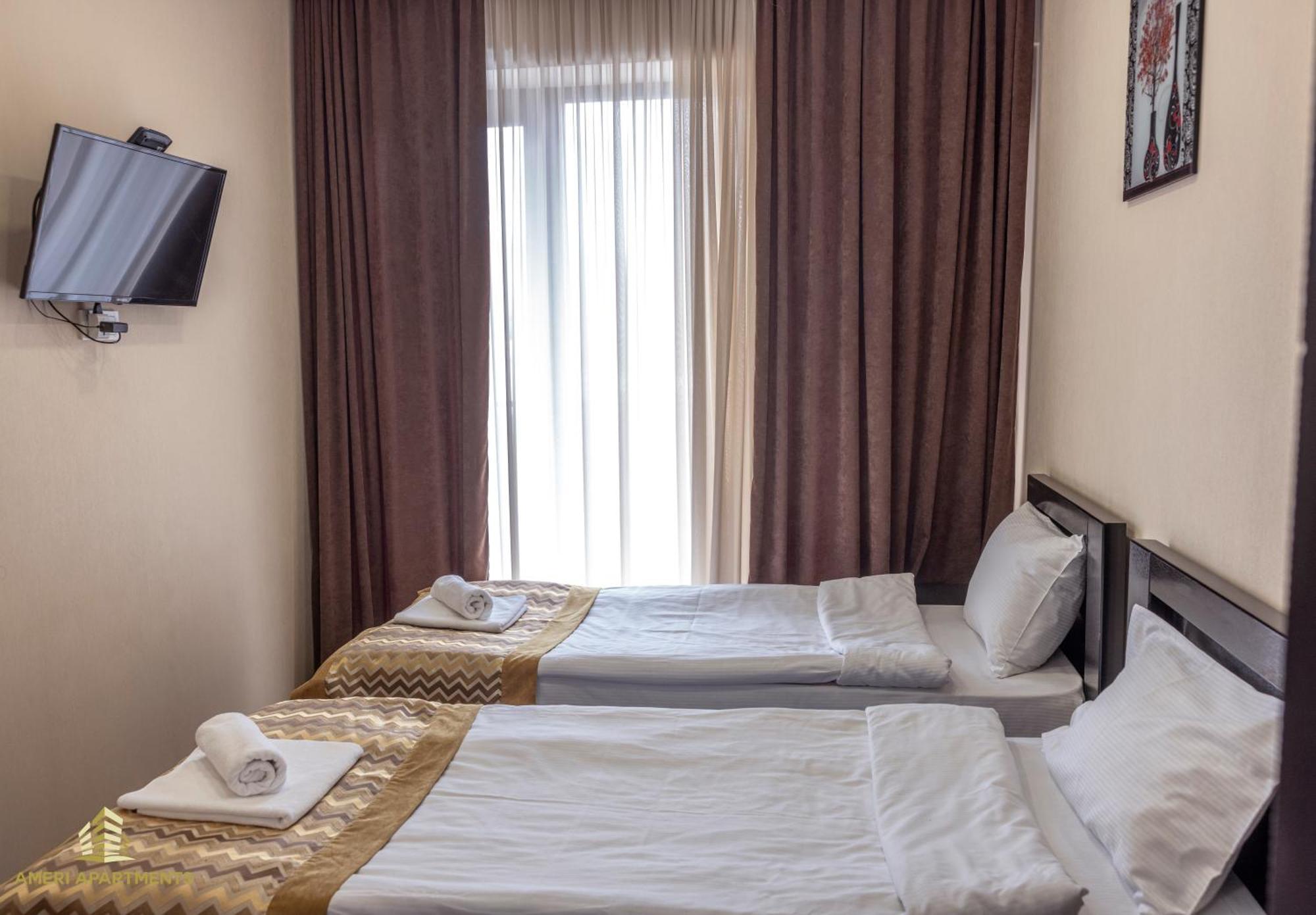 Ameri Apartments Тбилиси Номер фото