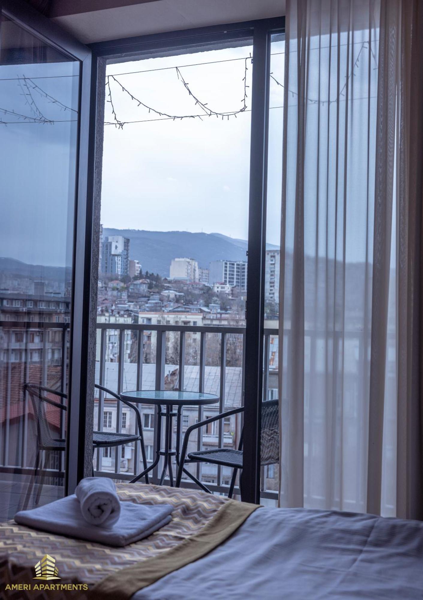 Ameri Apartments Тбилиси Номер фото